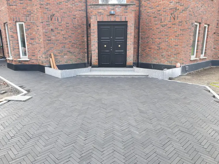 Charcoal herringbone forecourt and granite steps