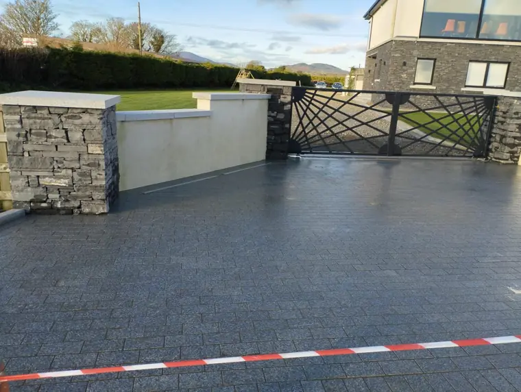 Granite setts in front of new gates